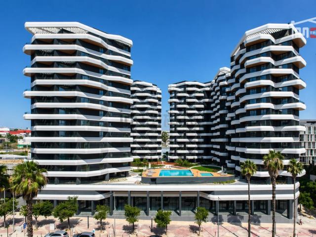 Apartamento T2 Parque das Nações Varanda e Vista Rio no Empreendimento Distrikt | Estacionamento