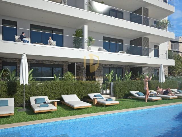 Apartamento T2 r/c com amplo terraço de 65.93 m2 acabamentos de alta qualidade em empreendimento com piscina, Tavira