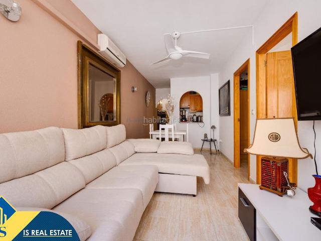 Apartamento en venta en Torrevieja, Las Piscinas Naturales. Apartamento con piscina comunitaria en la provincia de Alicante, en Torrevieja. 2 habitaciones 47 m² 600 metros del mar. Apartamentos.