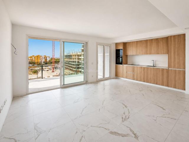 Apartamento en venta en Torrevieja, Punta Prima. EXCLUSIVO APARTAMENTO DE OBRA NUEVA EN RESIDENCIAL VALONIA ndash PUNTA PRIMA TERRAZA, GARAJE Y RESORT PRIVADO A 250 M DEL MAR Des. Apartamentos.