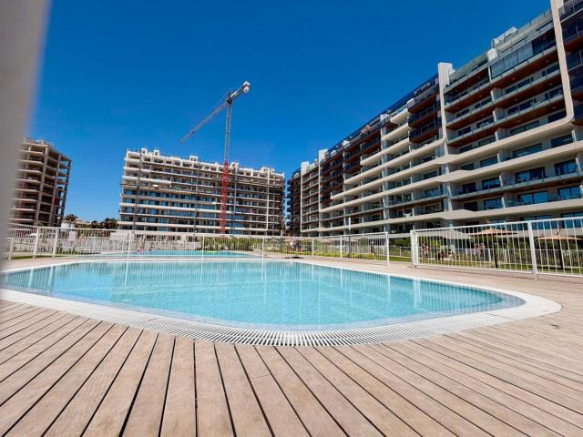 Apartamento en venta en Torrevieja, Punta Prima. EXCLUSIVO APARTAMENTO DE OBRA NUEVA EN RESIDENCIAL VALONIA PUNTA PRIMA TERRAZA, GARAJE Y RESORT PRIVADO A 250 M DEL MAR. Apartamentos.