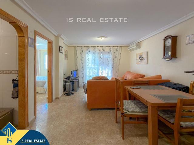 Apartamento en venta en Torrevieja, Zona Playa del Cura. Apartamento con terraza en venta en la provincia de Alicante, Torrevieja, Playa de los Locos. 2 habitaciones 59 m² 400 metros. Apartamentos.
