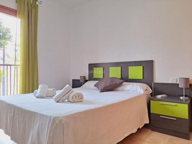 Apartamento en venta en Chiclana de la Frontera, La Barrosa. Bajo en urbanización Carrajolilla con piscina y pista de padel. Apartamentos Chiclana de la.
