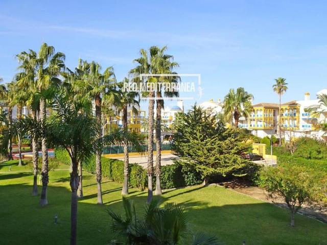 Apartamento en venta en Oliva, Oliva Nova. Apartamento con 2 terrazas, jardines, piscina y garaje en Las Dunas de Oliva. Apartamentos.