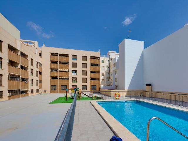 Apartamento en el centro con piscina comunitaria