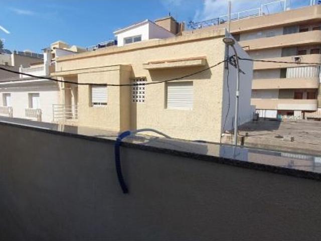 Apartamento en la playa de Daimús, zona Els Pedregals, con terraza privada en azotea
