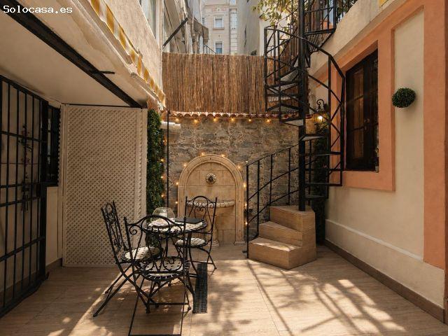 Apartamento estilo neobarroco en finca catalogada