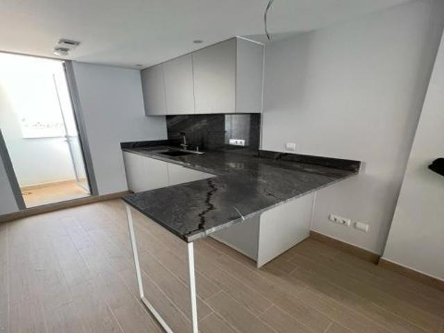 Apartamento junto al mar con vistas, plaza de garaje y 3 dormitorios en Calpe Alicante