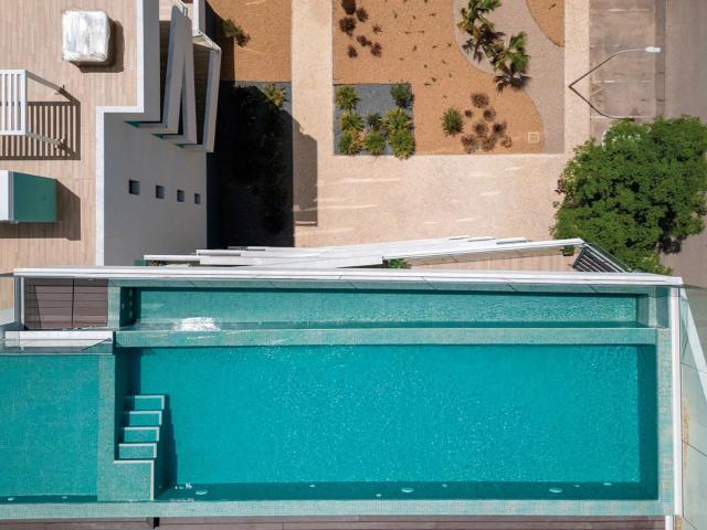 Apartamento Novo com piscina, garagem e grande varanda 60m² Faro Sé e São Pedro