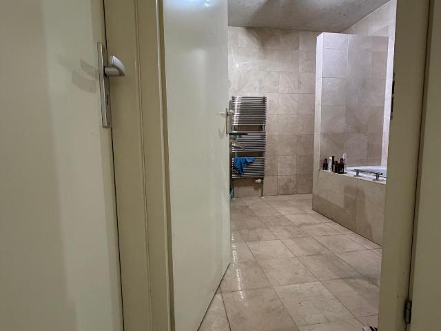 Apartement met prive tuin