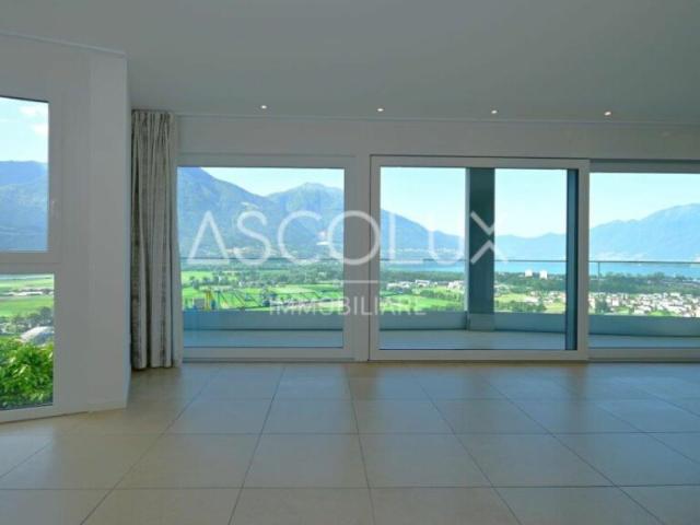 Appartamento di 3.5 locali con terrazza coperta, vista panoramica e vista lago