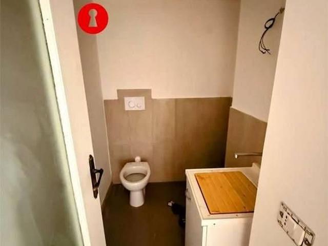 Appartamento di 55 m² con 2 locali e posto auto a