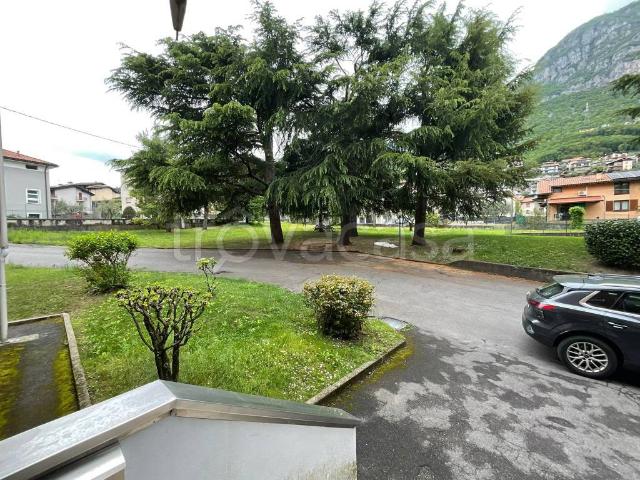 Appartamento in affitto a Costa Volpino, parzialmente arredato, giardino condominiale, balcone TrovaCasa
