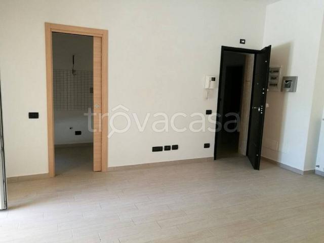 Appartamento in affitto a Fiumicino via Luigi Russo, 27G, giardino privato, cantina, doppi servizi TrovaCasa