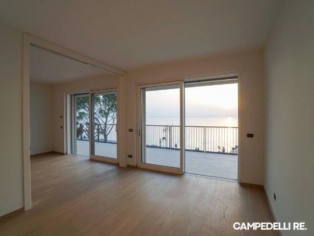 Appartamento in affitto a Lazise lungolago Marconi, 22, terrazzo, nuova costruzione, fronte lago TrovaCasa