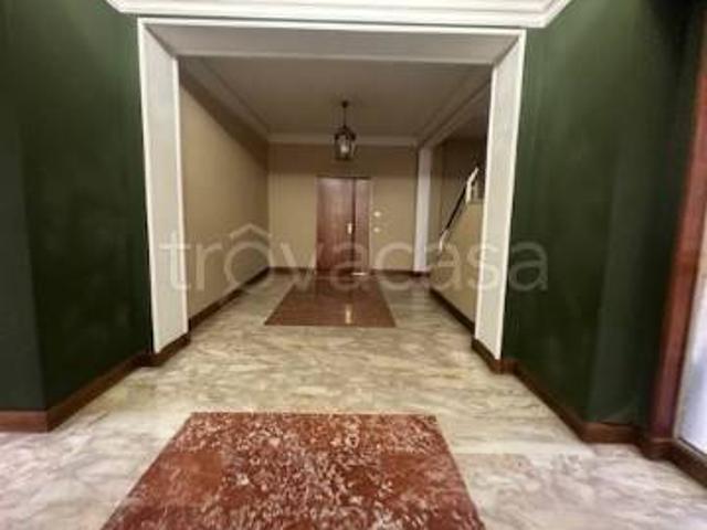 Appartamento in affitto a Roma via Bevagna, posto auto coperto, servizio di portineria, balcone TrovaCasa