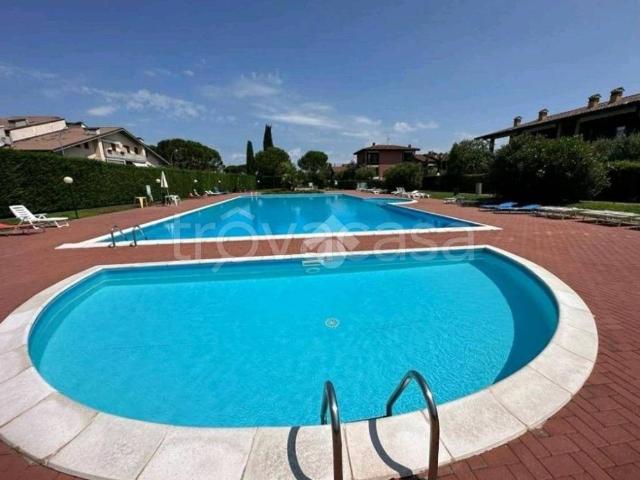 Appartamento in in affitto da privato a Desenzano del Garda via Giunio Bruto, 16, arredato, giardino, posto auto TrovaCasa