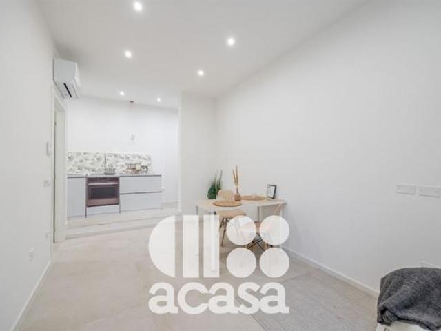 APPARTAMENTO NUOVO CON GIARDINO E GARAGE