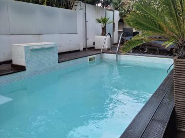 Appartamenti con Giardino e Piscina a Oristano