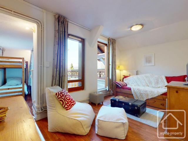 Appartement 4 à 6 couchages avec une large terrasse et place de parking dans un quartier calme