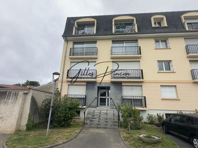 Appartement 4 pièces 73 M² avec balcon, garage et parking cave Centre ville