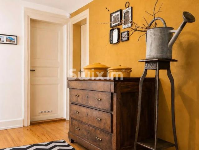 Appartement 4 pièces, trois chambres, combles et stationnement couvert