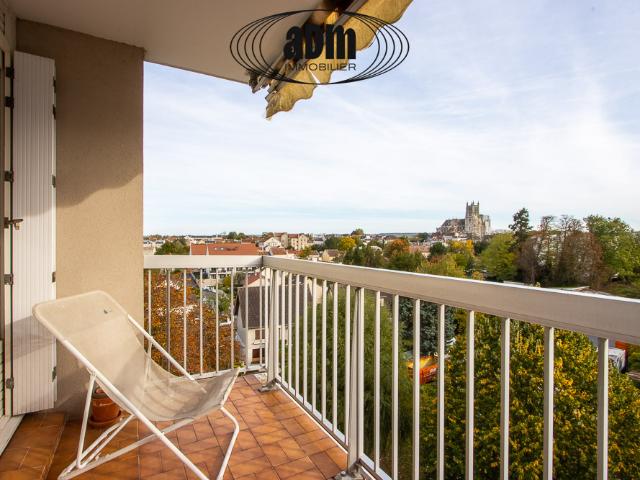 Appartement 4 pièces avec balcon, cave et garage