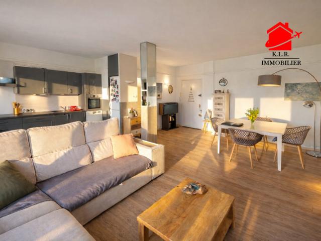 Appartement 4 pièces avec grand balcon, cave et parking