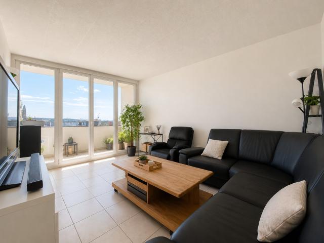 Appartement 4 pièces de 76m2 avec balcon, parking et cave