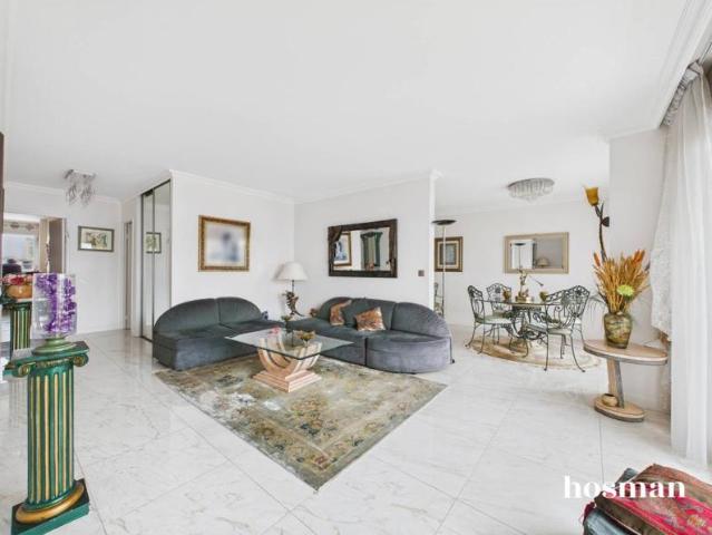 Appartement 4 pièces de 88 m² avec balcons, cave et parking Villa Curial, Paris
