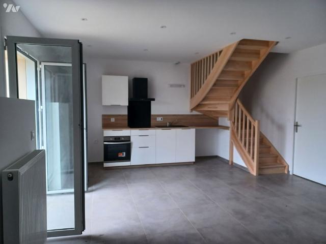Appartement 4 pièces en duplex avec jardin privatif et 2 stationnements