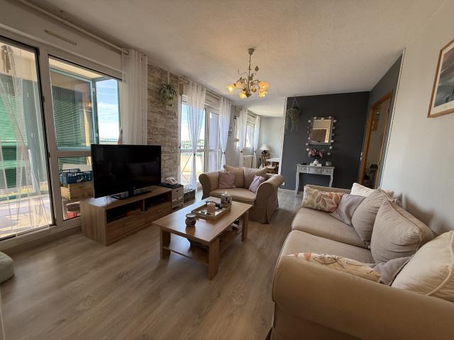 Appartement 5 pièces de 82,20 m2 avec une petite véranda, un balcon et un garage