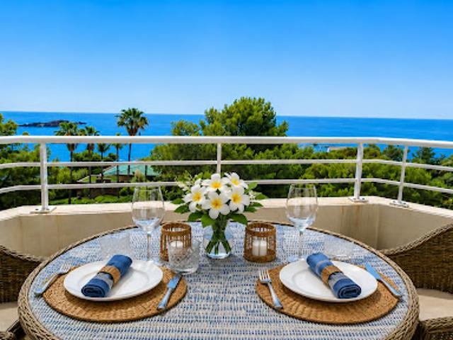 Appartement avec terrasse en bord de mer