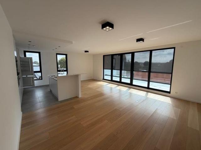 Appartement 2 chambres avec terrasse, parking et cave