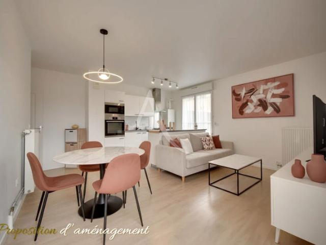 Appartement 2 pièces 44 m2 avec jardin + box + parking + cave en rdc
