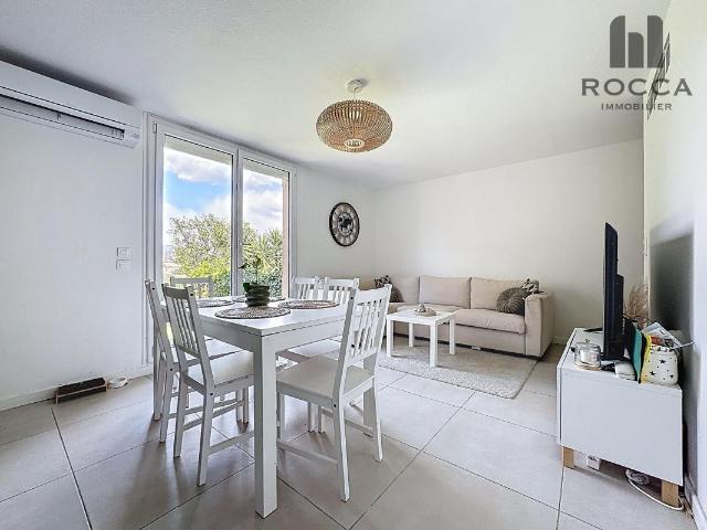 Appartement 2 pièces avec jardin et vue dégagée + garage clos