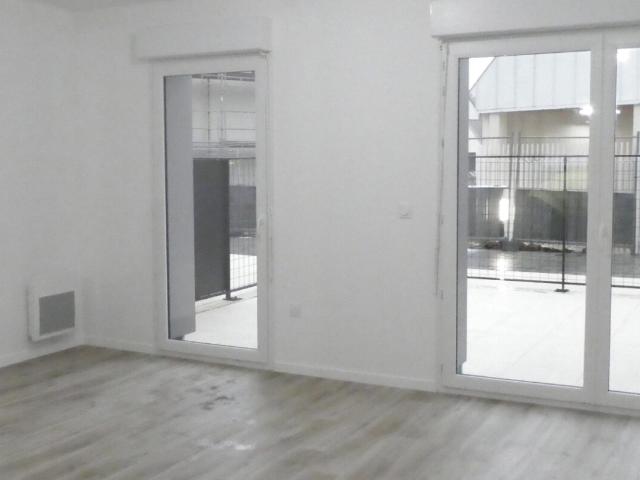 APPARTEMENT 2 PIÈCES NEUF AVEC TERRASSE ET PARKING