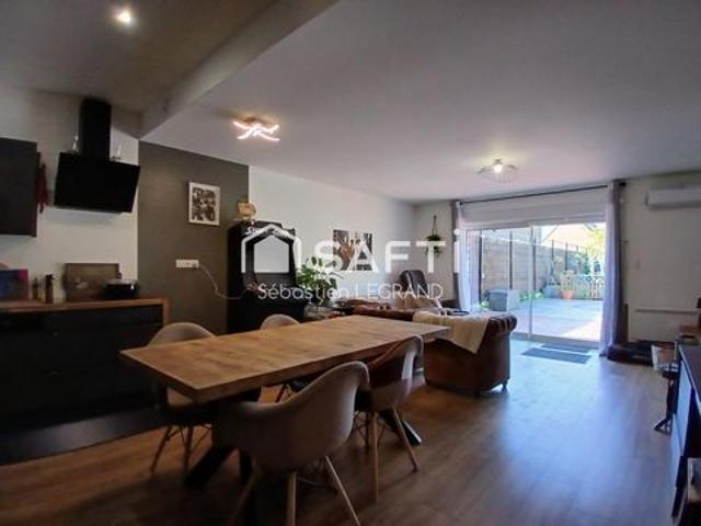 Appartement 3 chambres avec jardin, cave et parkings
