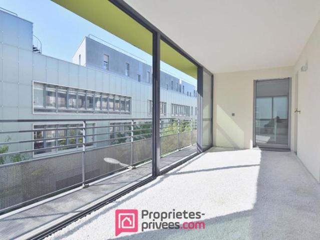 Appartement 3 pièces 66,03 m² Carrez avec 18 m² de jardin d'hiver et 8 m² de balcon filant