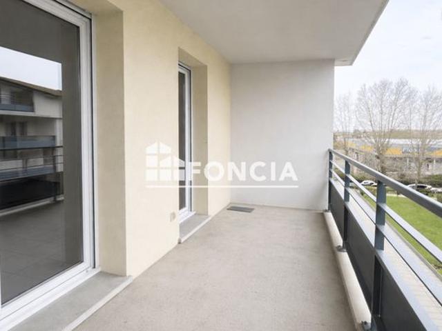 Appartement 3 pieces avec terrasse et 2 parkings en sous sol