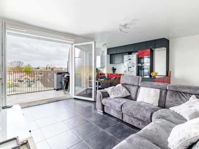 Appartement 3 pièces de 64 m² au dernière étage avec terrasse