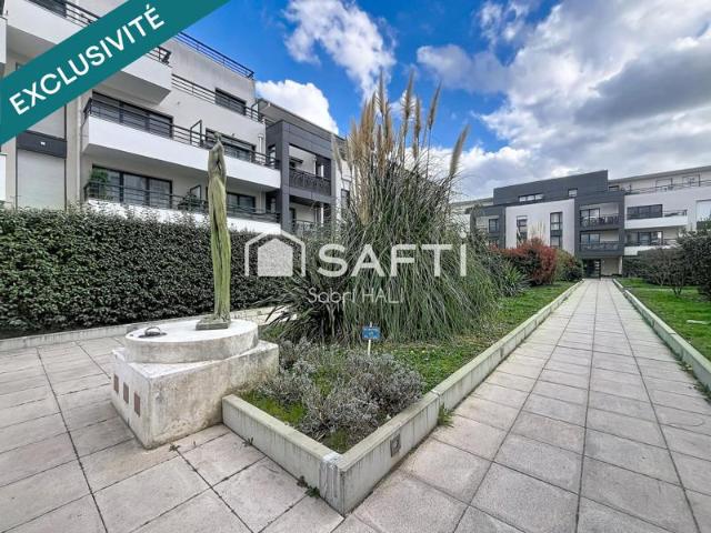 Appartement 3 pièces de 64m², immeuble de standing avec jardin et terrasse de 52m², exposé Sud Ouest