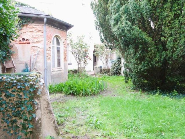 Appartement 3 pièces + jardin privatif 250 m² + dépendances 40 m²