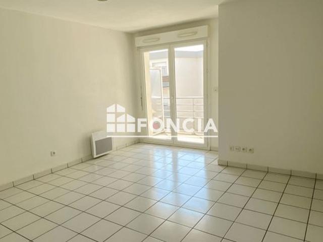 Appartement T3 avec balcon et place de stationnement