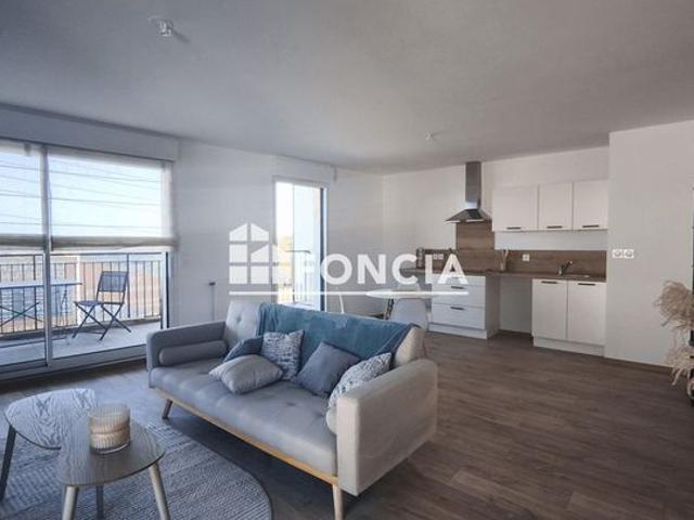 Appartement T3 bien situé, belles prestations, cuisine aménagée, grand balcon, garage