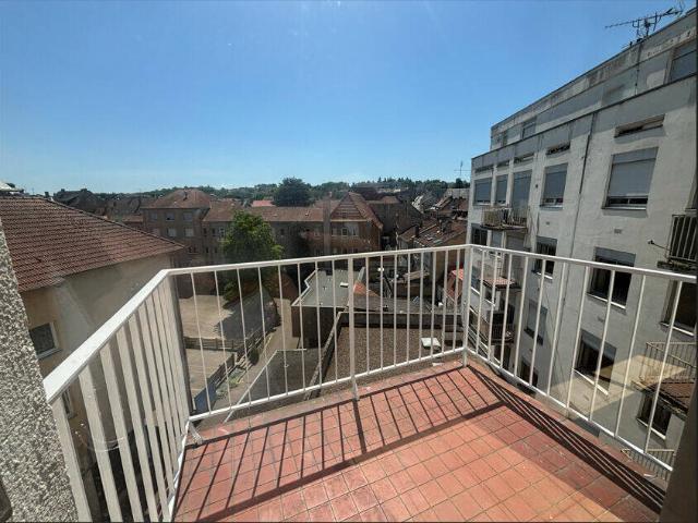 Appartement T3 centre ville de Sarreguemines avec cave, balcon et ascenseur
