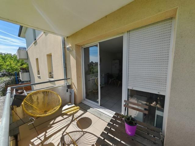 Appartement T3 de 55,74 m² avec balcon et parking privatif – Proche centre ville 32