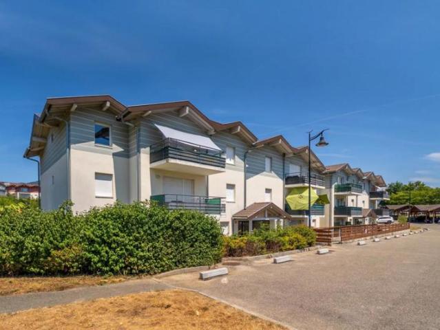 Appartement T3 de 58,27 m² avec balcon, carport et stationnement