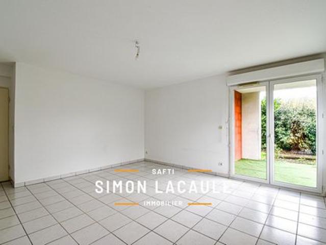Appartement T3, grand jardin privatif, garage boxé
