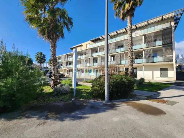 Appartement T3 récent de 62,70 m² avec terrasse de 12 m² et place de parking privative en souterrain